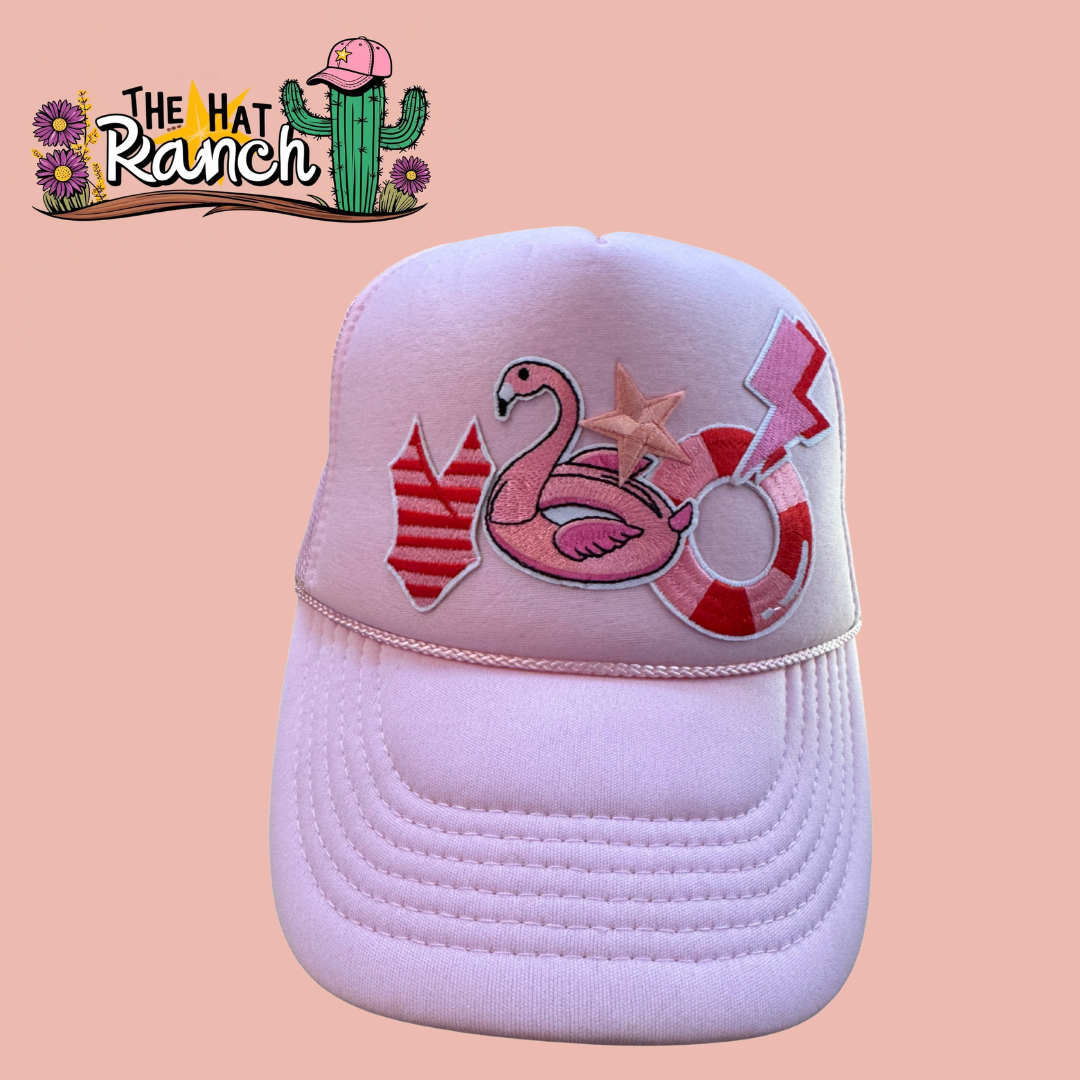 Pink flamingo/swimsuit trucker hat
